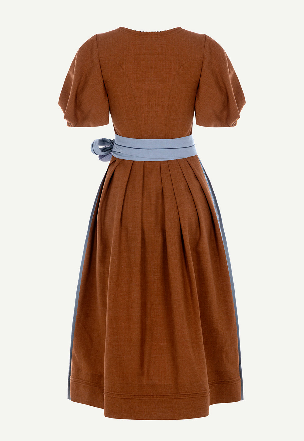 Back view of the Andrea Dirndl in Rust with a pleated linen skirt and contrasting light blue apron.