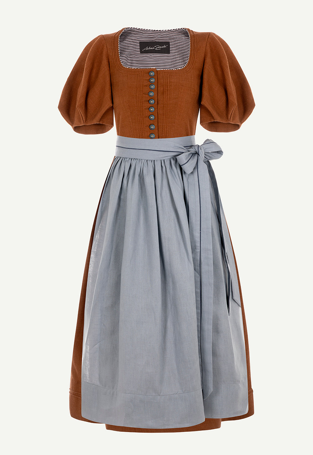 Andrea Dirndl in Rust with wide puff sleeves, hand-painted AZ metal buttons and contrasting light blue apron.
